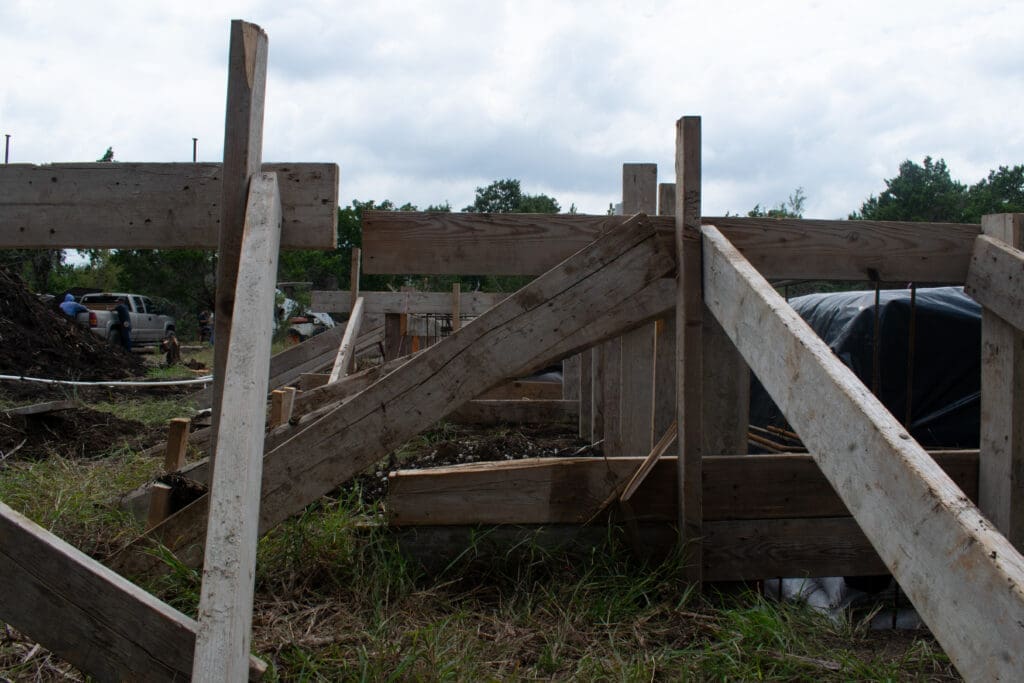 Custom home under construction in Dripping Springs TX by Ridge Rock Builders
