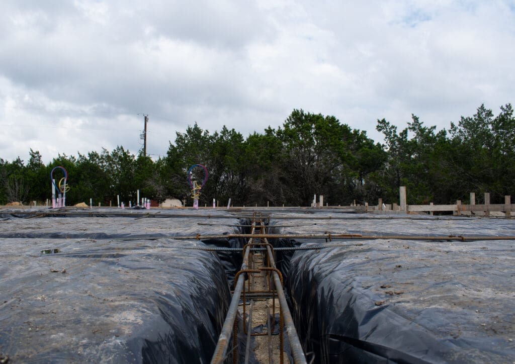 Custom home under construction in Dripping Springs TX by Ridge Rock Builders