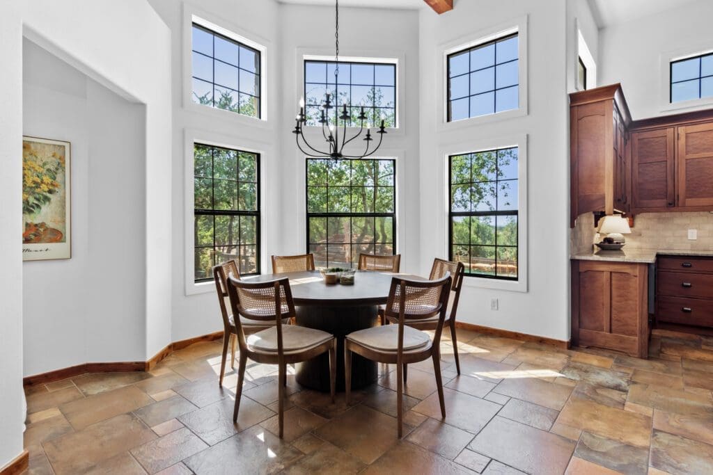 Custom home interior with large windows in Dripping Springs TX by Ridge Rock Builders