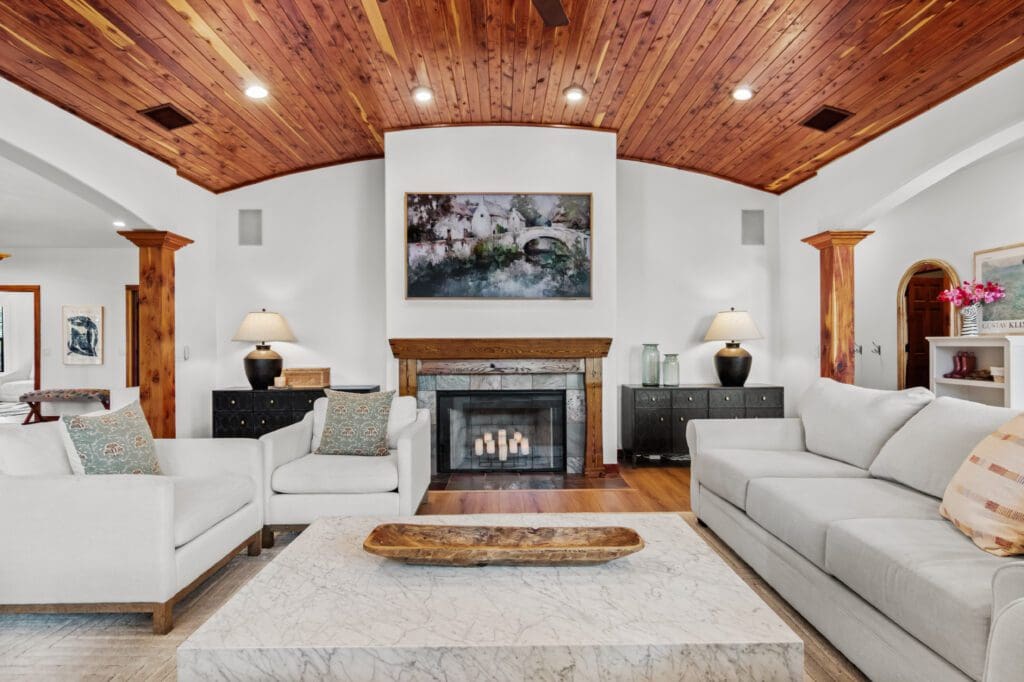 Custom home interior with wood ceiling and recessed lighting in Dripping Springs TX by Ridge Rock Builders