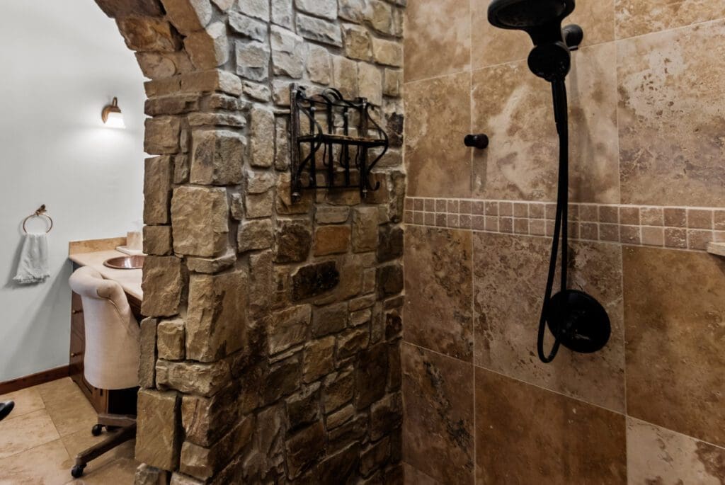 Custom home interior stone wall feature in Dripping Springs TX by Ridge Rock Builders