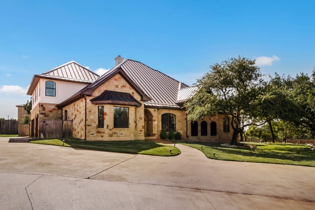 Custom home exterior in Dripping Springs TX by Ridge Rock Builders