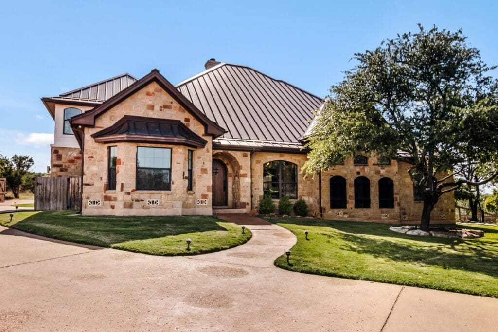 Custom home exterior in Dripping Springs TX by Ridge Rock Builders