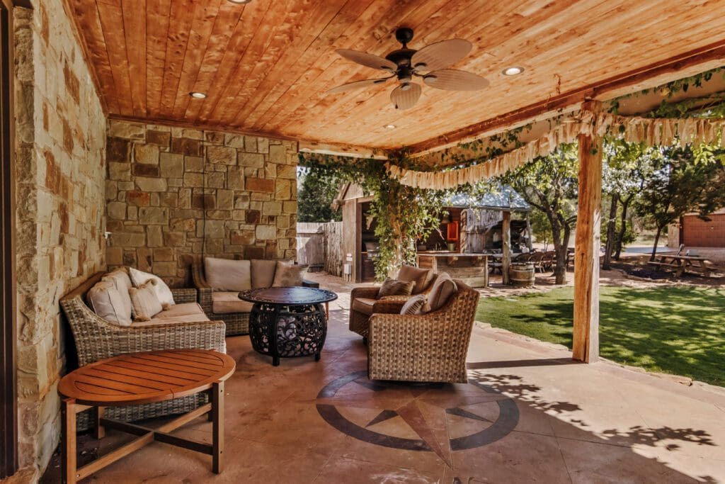 Custom home interior with wood ceiling and ceiling fan in Dripping Springs TX by Ridge Rock Builders
