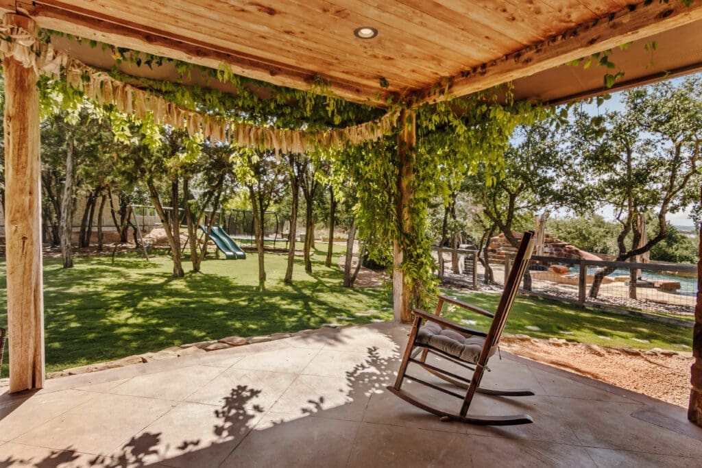Custom home covered outdoor patio in Dripping Springs TX by Ridge Rock Builders