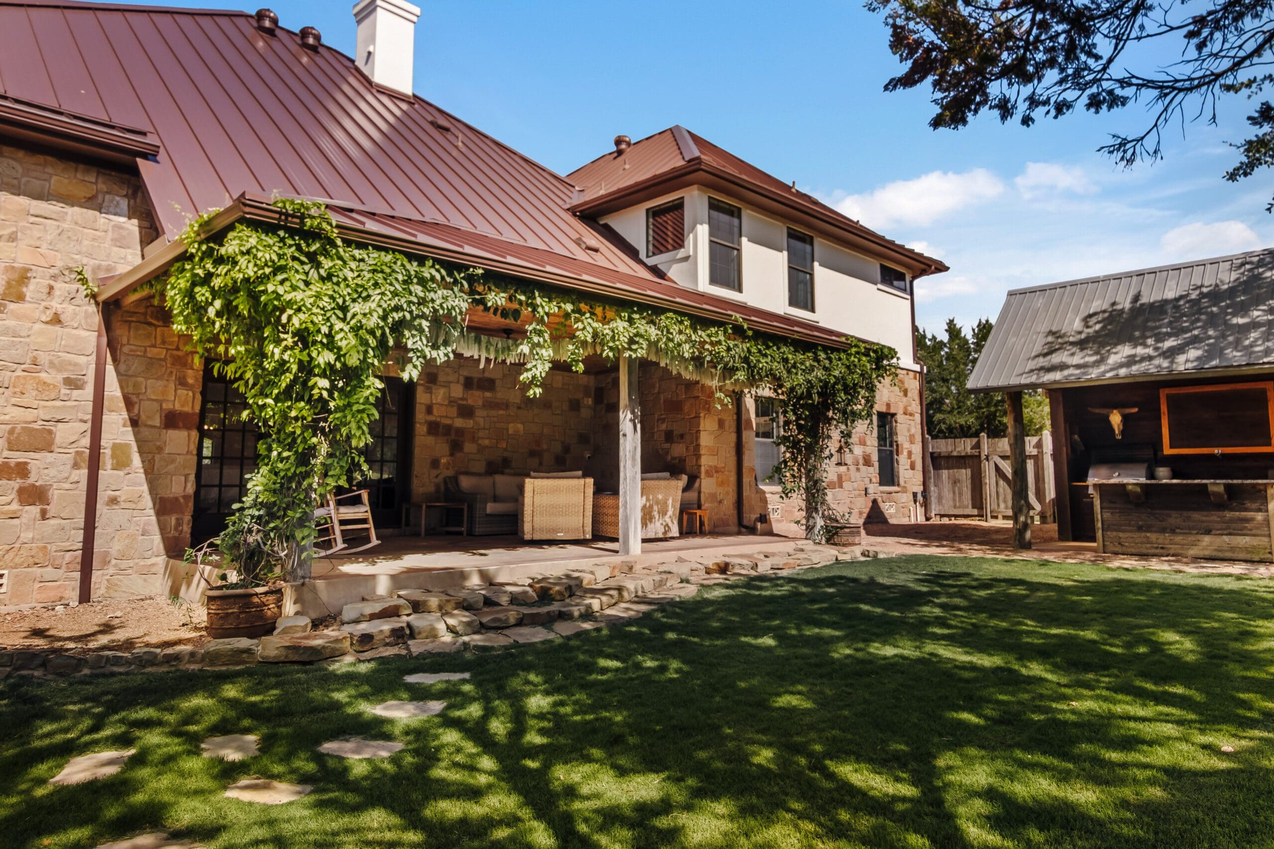 Custom home exterior in Dripping Springs TX by Ridge Rock Builders