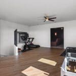 Home gym room in a custom Hill Country home by Ridge Rock Builders