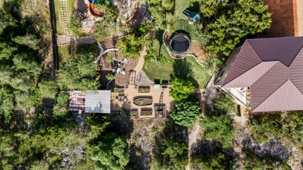 Aerial view of custom home in Texas Hill Country by Ridge Rock Builders