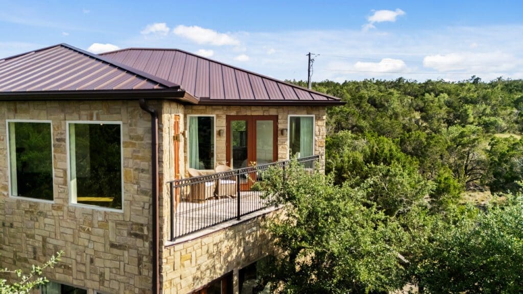 Aerial view of custom home in Texas Hill Country by Ridge Rock Builders