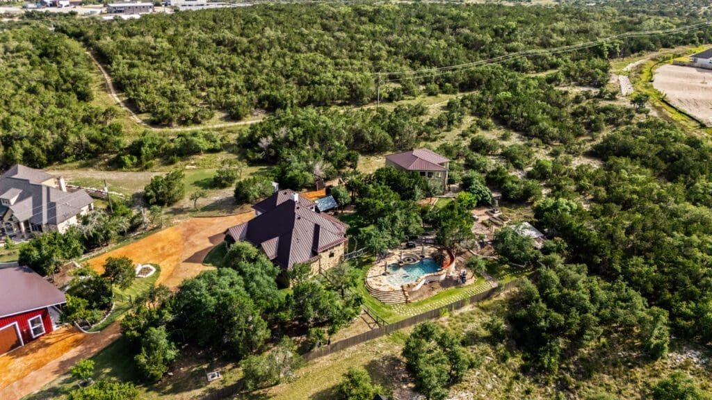 Aerial view of custom home in Texas Hill Country by Ridge Rock Builders