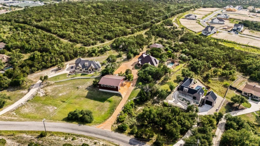 Aerial view of custom home in Texas Hill Country by Ridge Rock Builders