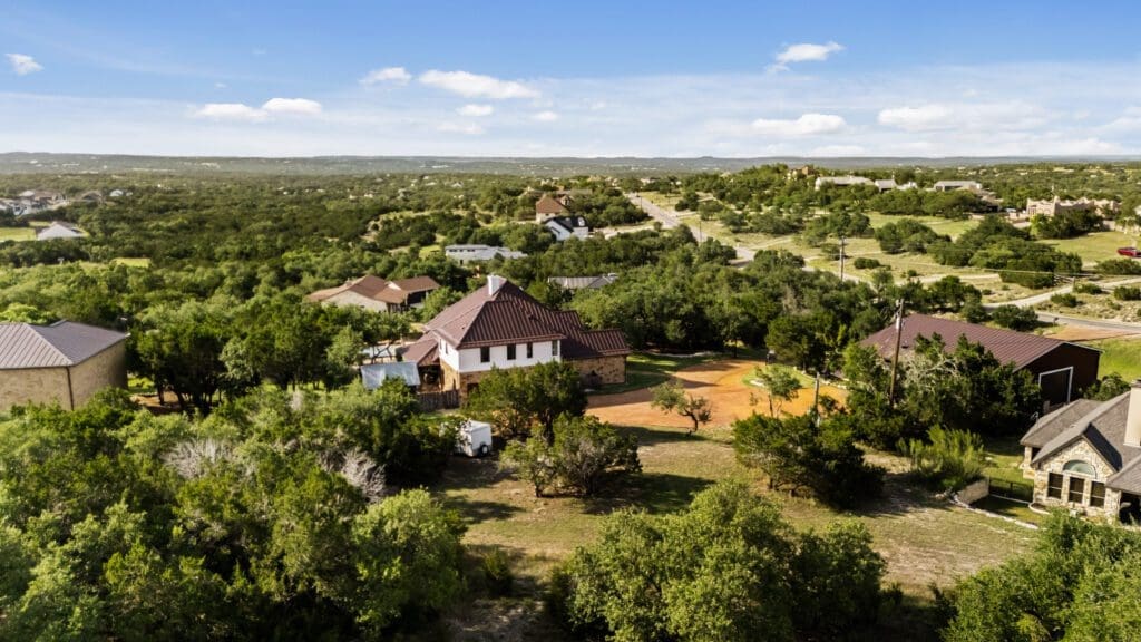 Aerial view of custom home in Texas Hill Country by Ridge Rock Builders