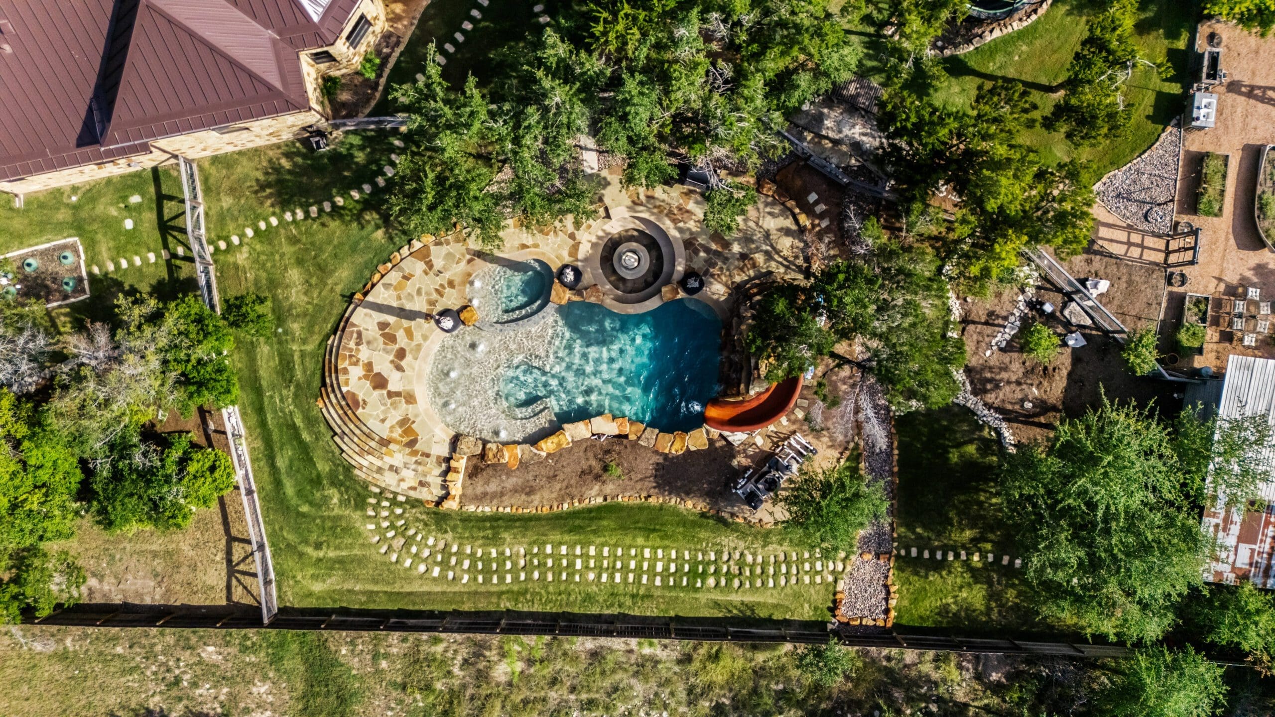 Aerial view of custom home in Texas Hill Country by Ridge Rock Builders