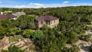 Aerial view of custom home in Texas Hill Country by Ridge Rock Builders