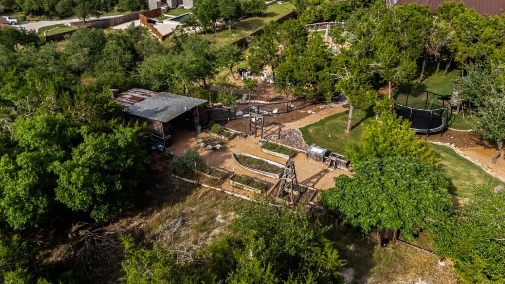 Aerial view of custom home in Texas Hill Country by Ridge Rock Builders