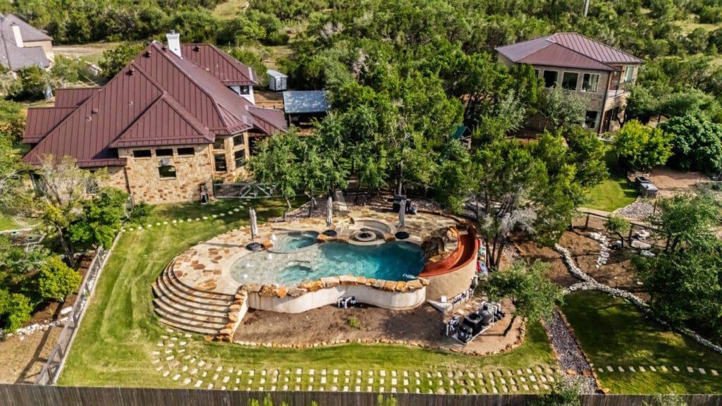 Aerial view of custom home in Texas Hill Country by Ridge Rock Builders