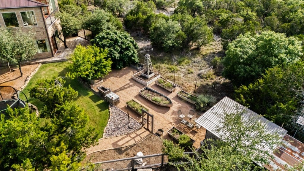 Aerial view of custom home in Texas Hill Country by Ridge Rock Builders